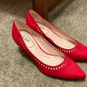 Red faux suede pumps